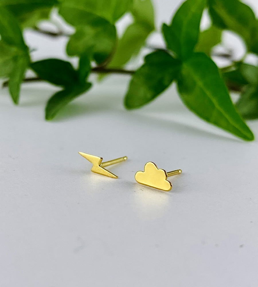 gold mismatched cloud and lightning bolt earrings