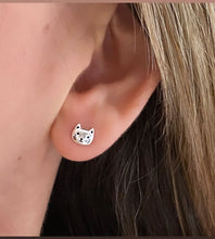 Load image into Gallery viewer, model wearing sterling silver cute cat head studs