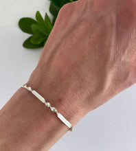 Load image into Gallery viewer, sterling silver herringbone bracelet on model