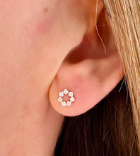 Load image into Gallery viewer, sterling silver sparkle circle studs in models ear