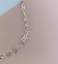 Load image into Gallery viewer, detail of the linked hearts anklet in sterling sivler