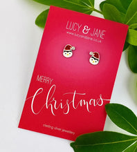 Load image into Gallery viewer, sterling silver christmas penguin earrings on a Merry Christmas card