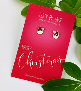 sterling silver christmas penguin earrings on a Merry Christmas card