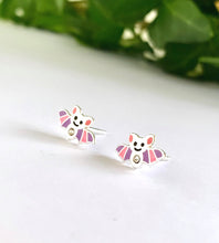 Load image into Gallery viewer, sterling silver bat stud earrings with touches of pink and purple on them.