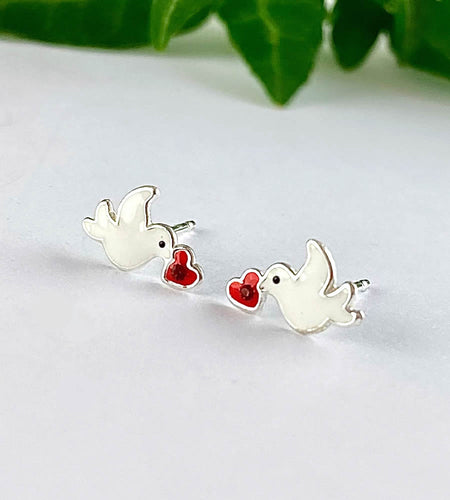 sterling silver white dove stud earrings holding a little red heart