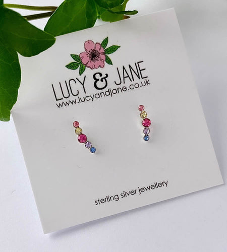 sterling silver rainbow sparkly ear climbers on white card