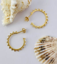 Load image into Gallery viewer, medium sized gold sun hoops with a stud fastening
