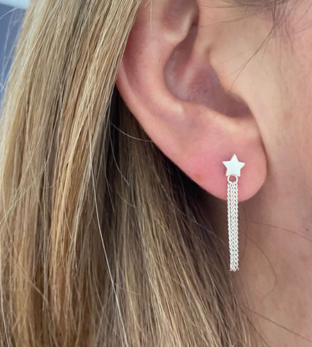 sterling silver star and tassel drop earrings on model