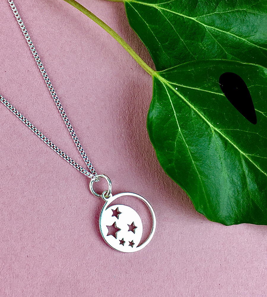 sterling silver moon and stars cut out necklace